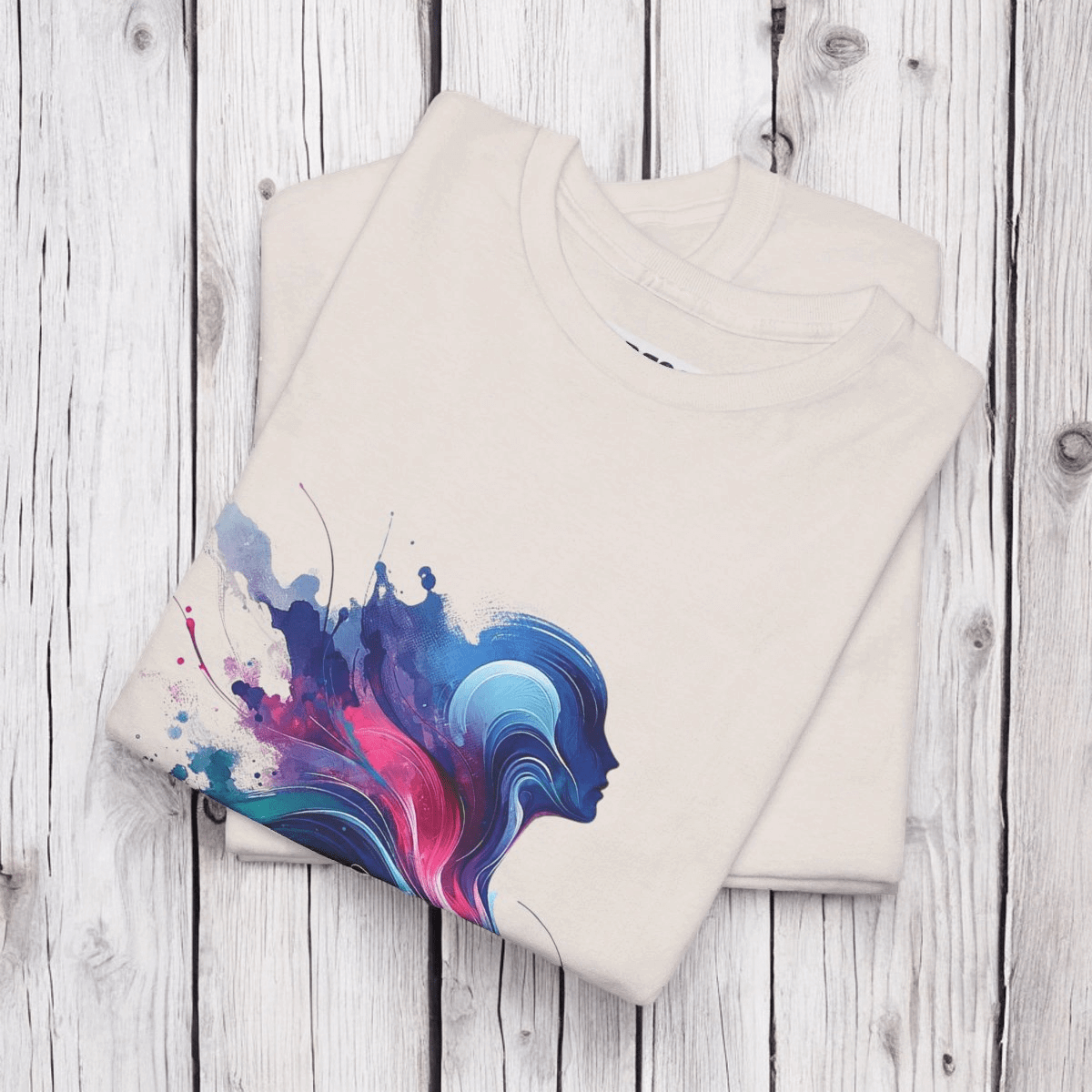 Cotton t-shirt in ice grey with abstract face graphic in blue and pink printed across the chest