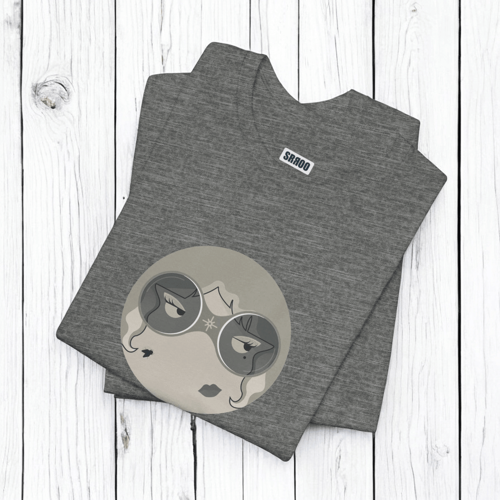 Gray tee with stylized woman's face with sunglasses in circular design with "SR100" text on wooden planks