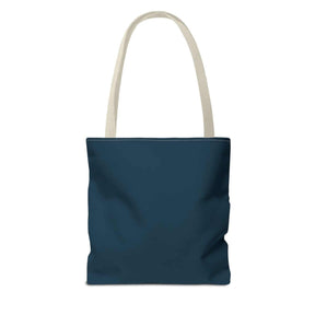 Dark navy canvas tote bag with beige cotton handles, minimalist design, and unstructured rectangular body