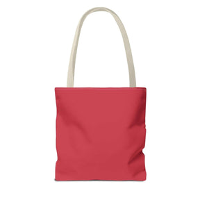 Red canvas tote bag with cream-colored handles, minimalist rectangular shape, and visible topstitching detail