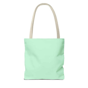 Mint green tote bag with beige canvas handles, minimalist design and structured rectangular body in fabric texture