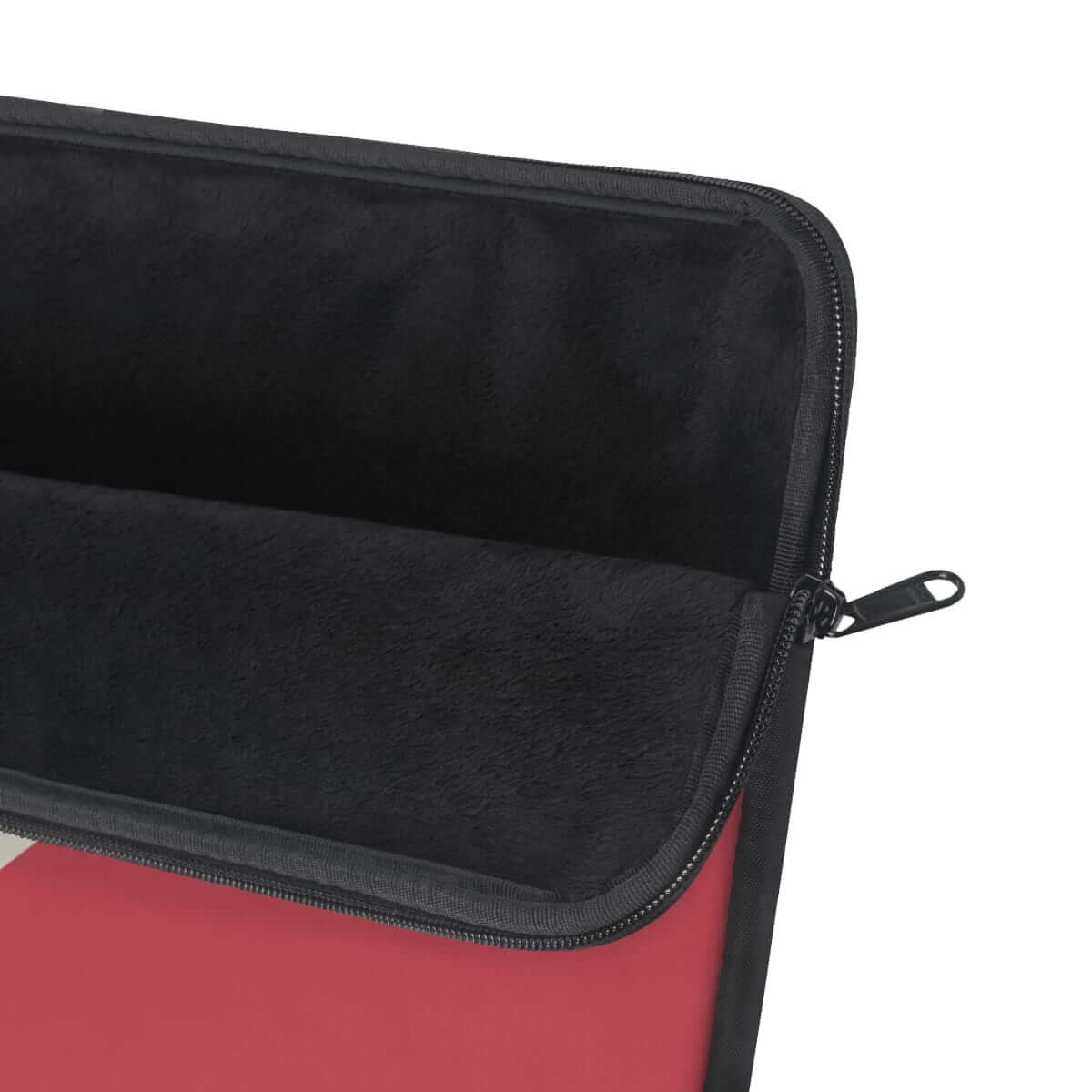 Black laptop sleeve with red interior, zip closure, and textured material in slim minimalist rectangular design