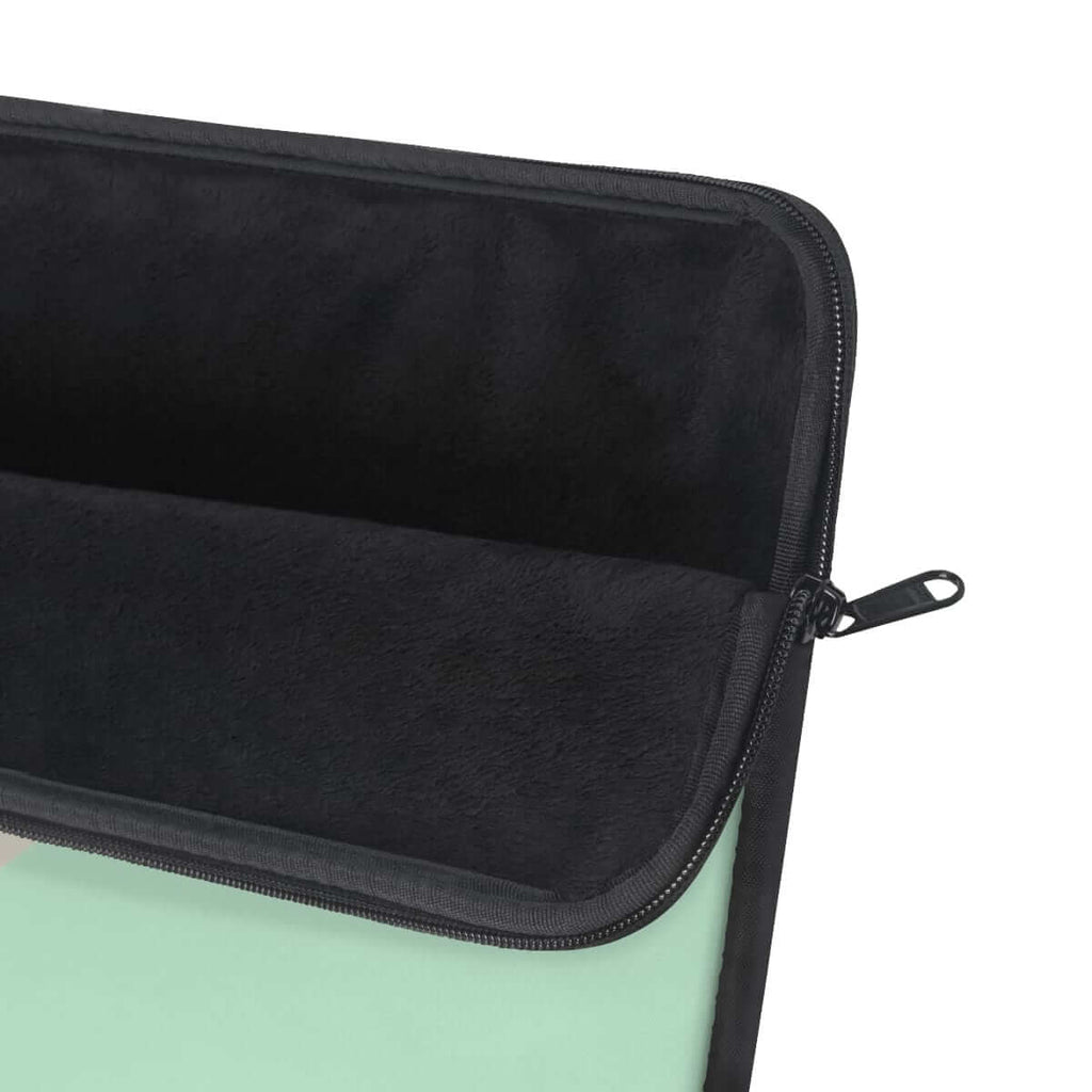 Zippered carrying case with light green fabric exterior and black mesh compartments inside the structured interior