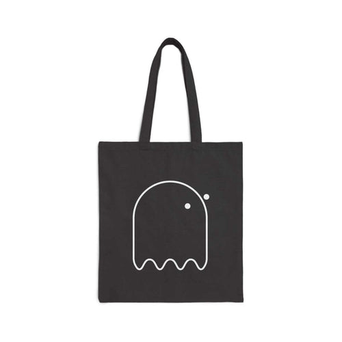 Black canvas tote bag with a white ghost outline graphic on the front and dual black shoulder straps