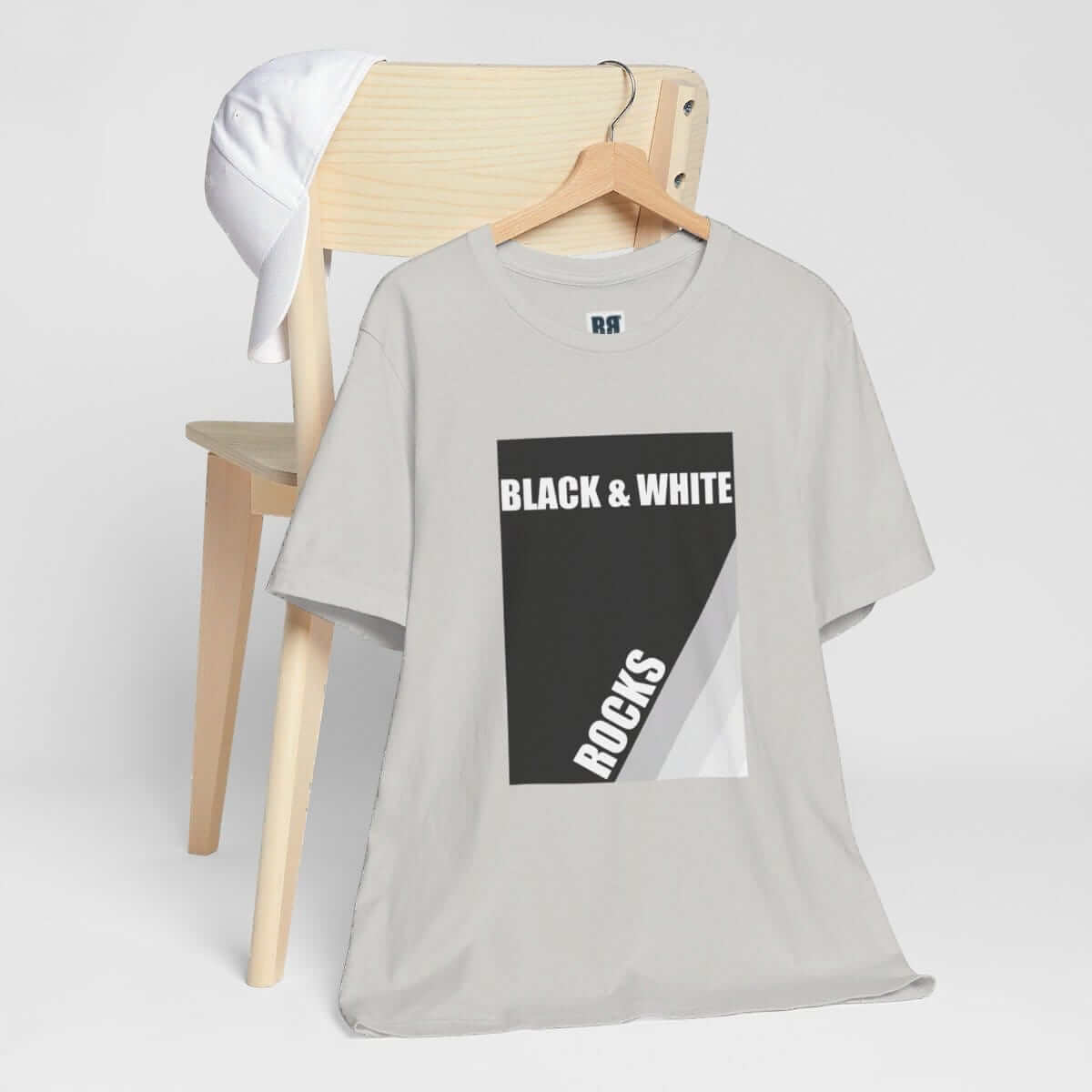 Black and white cotton short sleeve t-shirt with graphic rock print on front and relaxed fit style