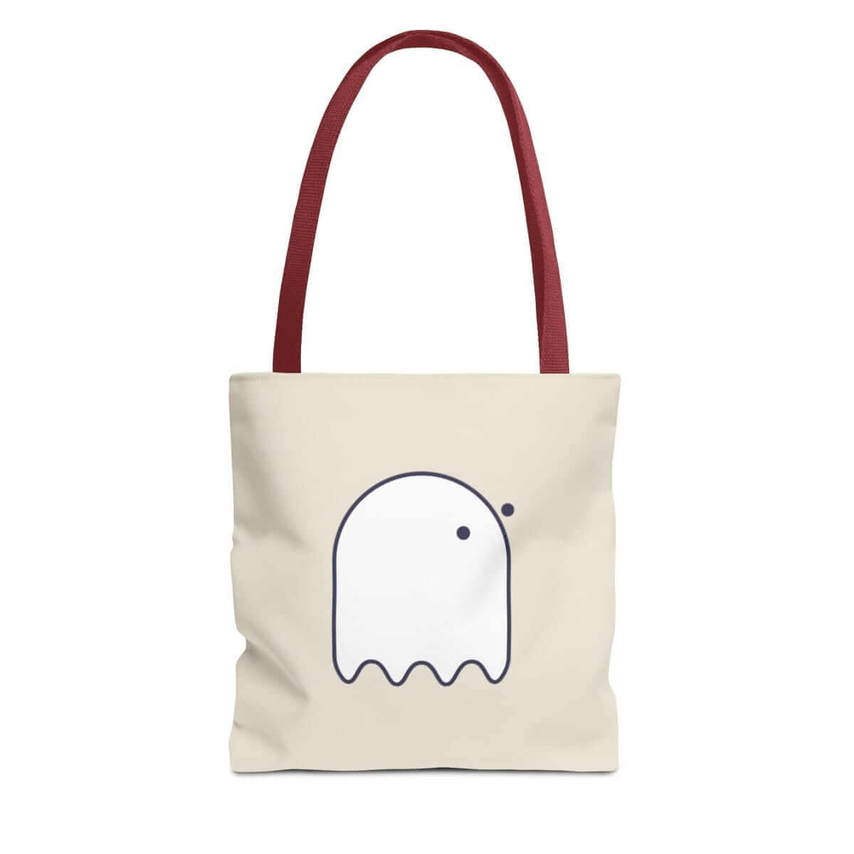 Red canvas tote bag with black button eyes graphic and wide square shape featuring dual top handles