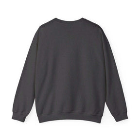 Dark gray knit sweater in a casual style, worn by a person facing away, featuring ribbed hem and relaxed fit
