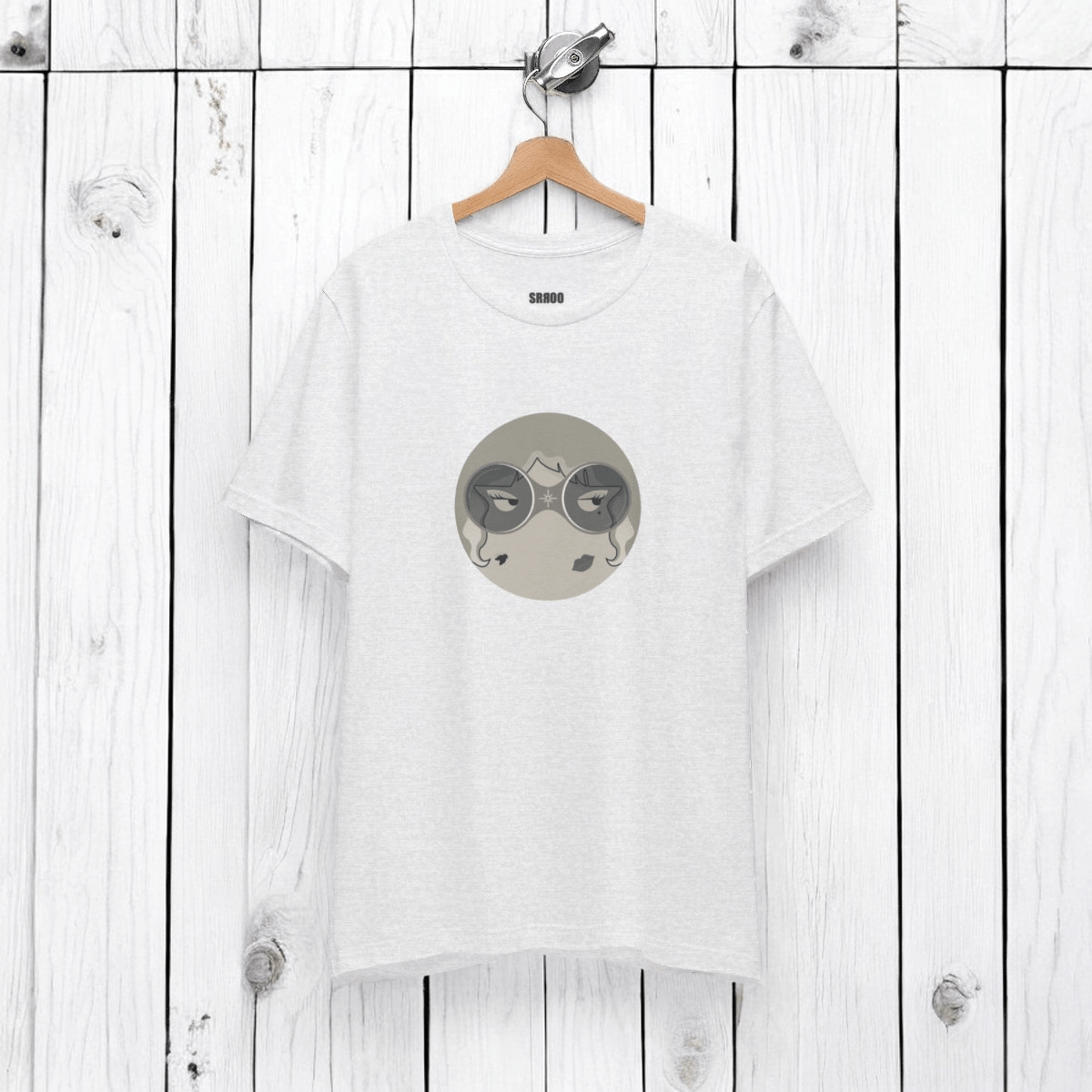 Black short sleeve tee made of soft cotton featuring a relaxed fit and small embroidered character design on the chest