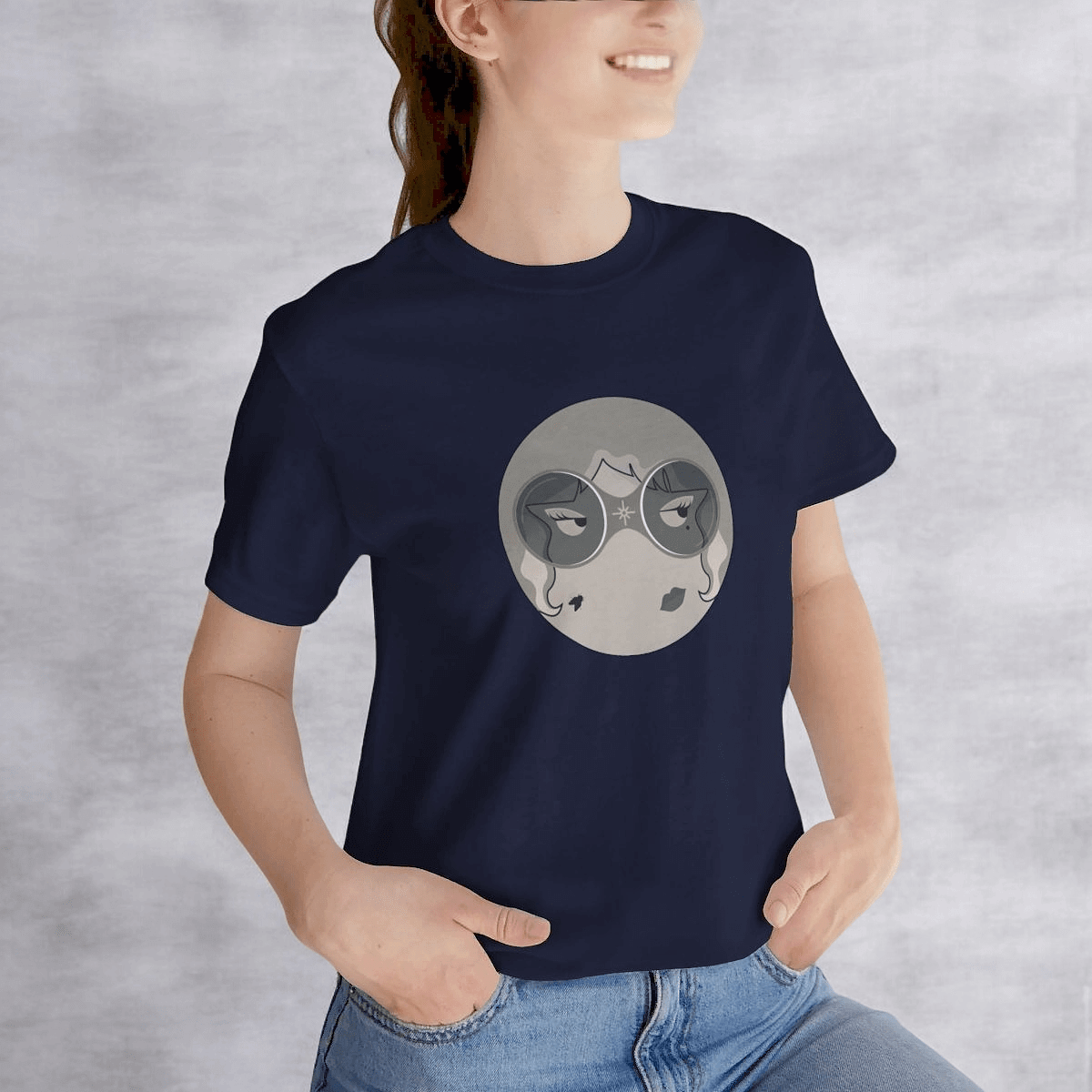 Black short sleeve tee made from soft cotton with a relaxed fit and round neckline featuring a small printed graphic on the chest