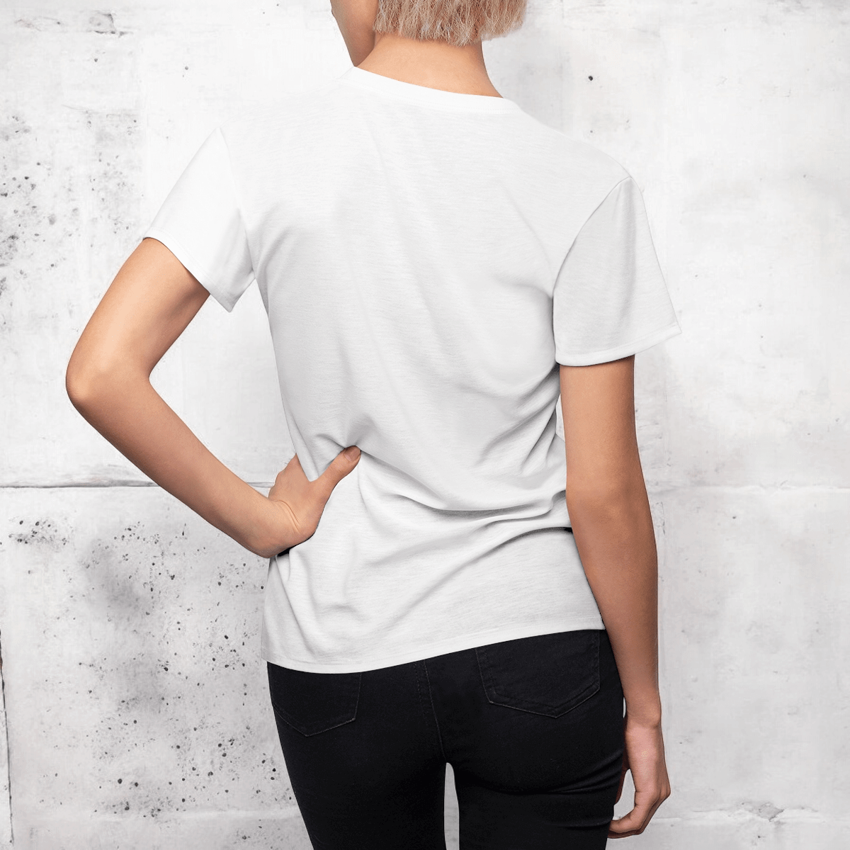 White cotton crew neck t-shirt with short sleeves and relaxed fit worn with black straight-leg pants