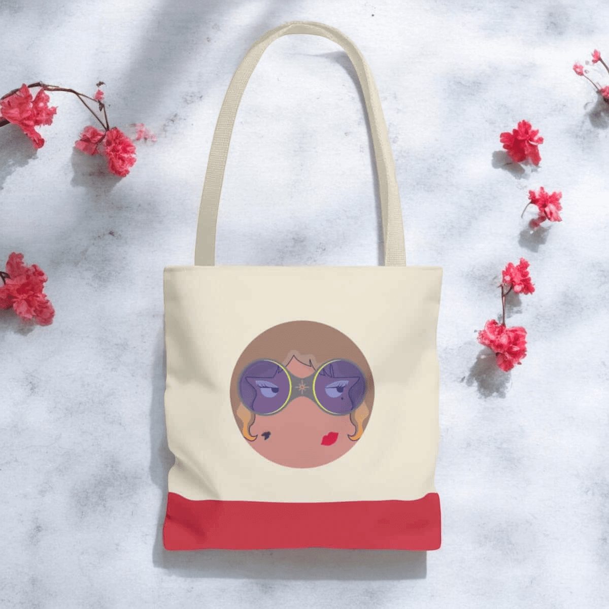 Beige canvas tote bag with leather handles and adjustable shoulder strap featuring a spacious rectangular shape