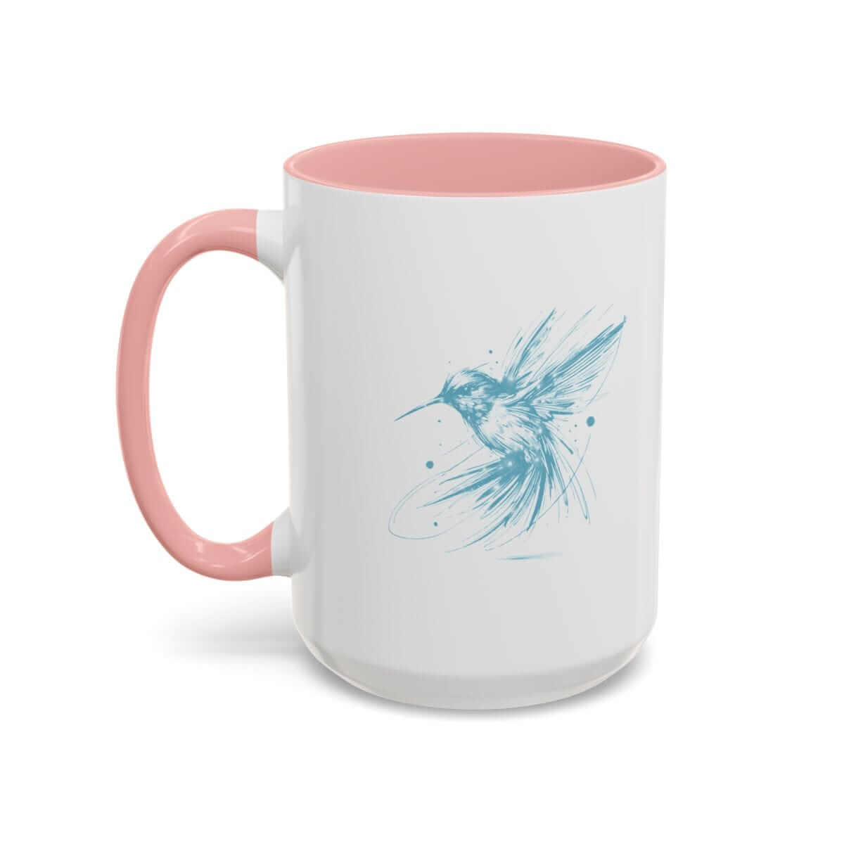 White ceramic mug with pink handle featuring a blue hummingbird illustration in an artistic watercolor style