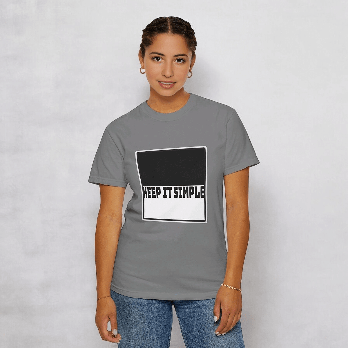 Grey cotton casual t-shirt with KEEP IT SIMPLE printed text, worn with blue denim jeans in front-facing view