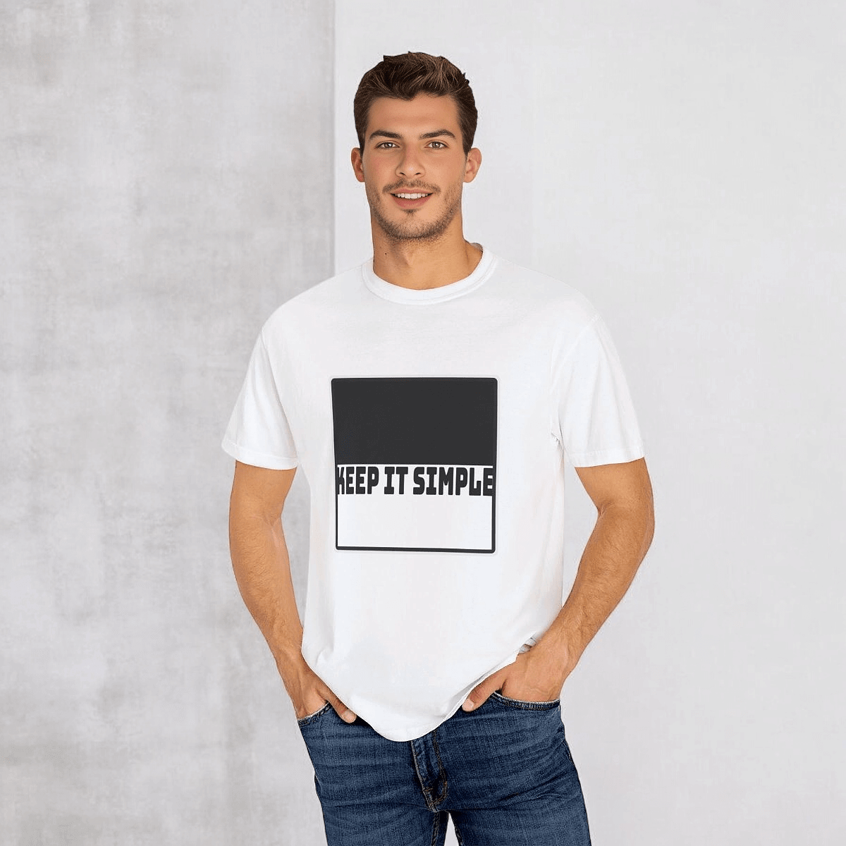 White cotton t-shirt with black KEEP IT SIMPLE text on chest, worn with light blue jeans against gray backdrop