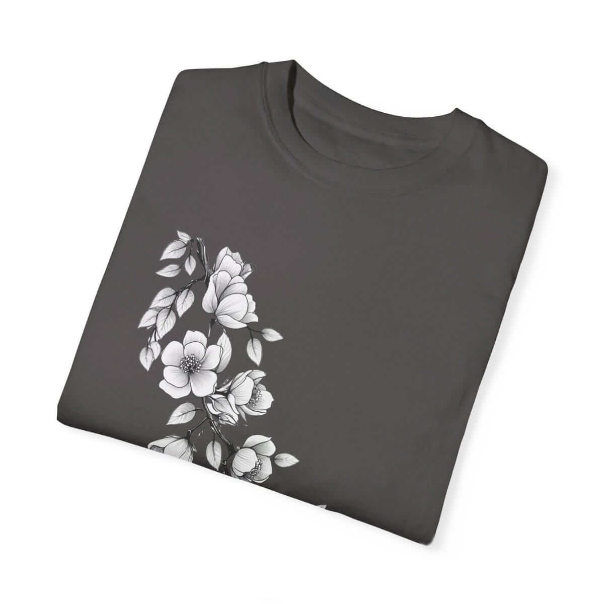 Dark gray cotton t-shirt with white floral print along the left side, neatly folded showing front design