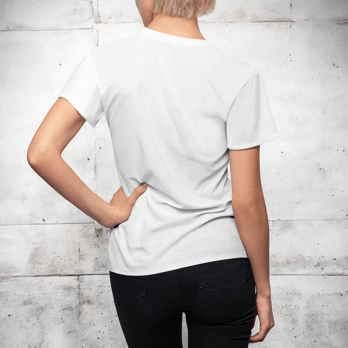 White cotton button-up shirt with classic collar and black jeans worn by person standing against concrete background