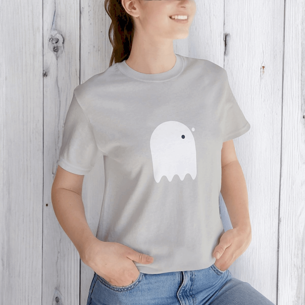 White cotton short sleeve t-shirt with a black button eyed ghost graphic printed on the front in casual style
